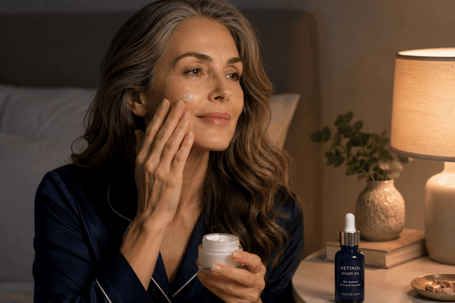 Applying retinol at night as part of a menopause skincare routine
